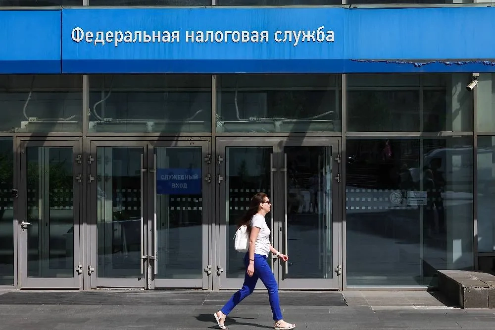 Заявление на налоговый вычет можно подать через налоговую инспекцию. Фото © ТАСС / Наталья Шатохина