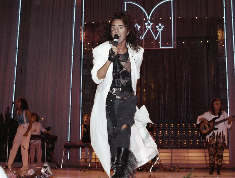 Пальто — тоже один из любимых элементов в образе Валерия Леонтьева. Фото © РИА «Новости» / Юрий Абрамочкин