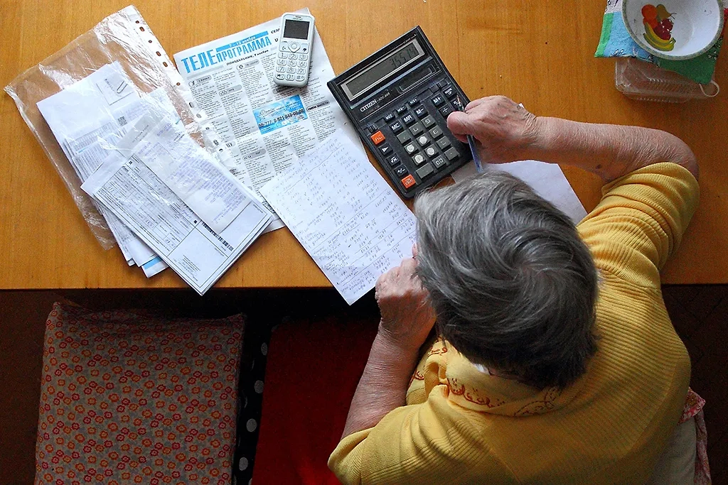 Кому положены льготы на оплату ЖКУ — список. Фото © ТАСС / Роман Храмовник