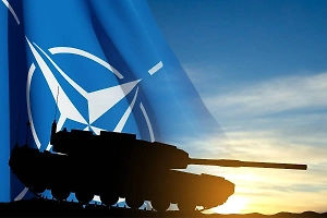 НАТО смягчила риторику по России в итоговом документе саммита