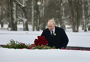 Путин в годовщину снятия блокады впервые надел ленту Ленинградской Победы